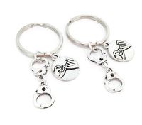 Wholesale 2019 New Ancient Silver Criminal Gang Handcuffs Pendant Hand In Hand Sisters Keyring Keychain Europe United States Popular Hot Sale Jewelry