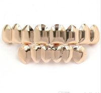 Wholesale 2019 Hot sale Teeth Fangs Fashion Gold plated Rhodium HIPHOP Teeth Grillz TOP BOTTOM Rock Dental Grills Sets Halloween props