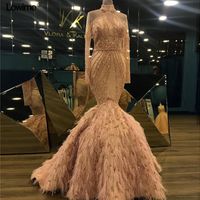 Wholesale 2020 Blush Pink Crystal Beaded Mermaid Prom Dresses With Feathers Sexy Open Back Long Sleeves Crystal Beaded Evening Gown Arabic Formal Gown