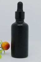 Wholesale 50ml essential oil bottle glass dropper bottle matte black round with gold silver black cap for e liquid cosmetic perfume custom print