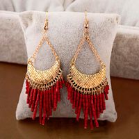 Wholesale 2020 New Bohemia Gold Metal Moon Shaped Red Rice Beads Jhumka Tassel Drop Earrings For Women Ethnic Gypsy Jewelry