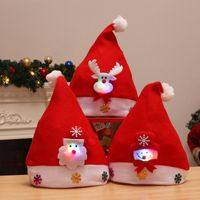 Wholesale Christmas Decorations Kids Adult LED Santa Claus Reindeer Snowman Hat Xmas Party Costume Gift Cap