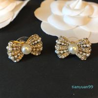 Wholesale Hot Sale Light luxury fashion bow earrings accessories rhinestone size rice pearl earrings ladies wedding jewelry
