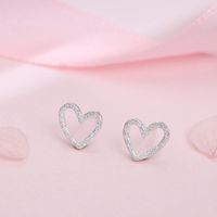 Wholesale 2020 Hollow frosted love heart shaped mini exquisite earrings cute heart shaped stud earrings silver earrings female party accessories
