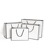 Wholesale White Present Paper Bags Kraft Card Packaging Bag Cloth Fashion Storage Handbag Thickening Shopping Advertising Custom gr B2