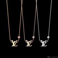 thin gold chain necklace with small diamond