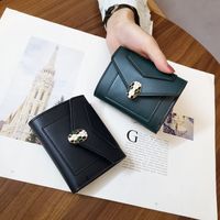 Wholesale 2020 designer new small wallet women short European and American plain snake head ladies wallet student fashion three fold coin purse