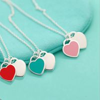 Wholesale enamel heart shaped necklace European and American fashion blue heart powder heart double heart pendant clavicle chain female simp