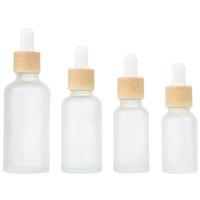 Wholesale Empty Refillable Dropper Bottles Frosted Glass Vial Cosmetic Container Jar Holder Sample Bottle with Imitated Wooden Lids