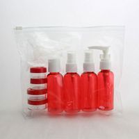 Wholesale Travel Bottles Set For Cosmetics Packaging Empty Red Plastic Container With Lotion Cream Pump Mist Spray Screw Cap