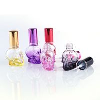 Wholesale Colorful Skull Glass Perfume Bottle Essential Oil Perfume Bottle Spray Bottles ml Plating Cap with Double Silver Ring HHD4707