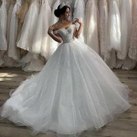 Wholesale 2020 New Sexy Ball Gown Wedding Dresses Pearls Beadings Off Shoulder Tulle Plus Size Chapel Train Corset Back Formal Bridal Gowns