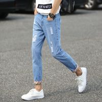 Wholesale Cropped trousers Fashion Casual men s small Ripped hole ripped jeans male students summer slim casual harem pants teen