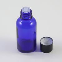 Wholesale Empty bottles with stoppers oz ml blue glass bottle black lids cosmetic packaging