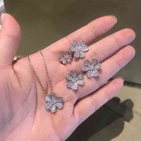 Wholesale Band Ring Rings Net Red Tide Women s Fashion Niche Design Diamond Inlaid Clover Shining Personalized Earrings Necklace Flower Ring
