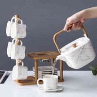 Wholesale Japane Stype Ceramic Kung Fu Tea Coffee Set with Stand Rack Teapot Jug Set European Afternoon Tea Cup and Saucer Set