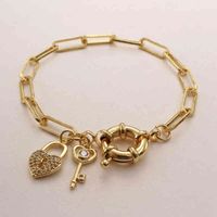 Wholesale 3A zircon key lock wings lucky Bracelet men s and women s hip hop real gold plated thick chain jewelry