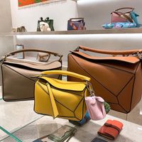 Wholesale 2021 New Unisex Mini Geometric Bag Rhombus Leather Womens Bag Shoulder Crossbody Hand Holding Pillow Bag Soft Leather