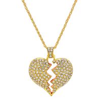 Wholesale Hip hop personality two half heartbreak combination pendant copper inlaid with zircon broken heart magnetic pendant couple necklace