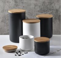 Wholesale Nordic Ceramic Storage Jar with Bamboo Lid Airtight Sealed Canister Set of Container for Coffee Tea Sugar Spice Black White