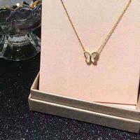 Wholesale Korean fashion K golden shell titanium steel butterfly necklace women s fashion short sweater chain simple temperament clavicle chain