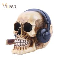 Wholesale Resin Craft Skull Head With Headphones Art Painting Movie Props Skull Ornament Music Bar Decoration Statues Sculptures