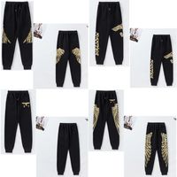 Wholesale Men s Pants bronzing eagle wings printing casual sports trousers men and women with the same paragraph footwear library