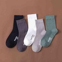 Wholesale Autumn winter Khmer business solid color breathable cotton middle tube men s socks single and double packaging