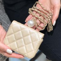 Wholesale 2021 Ladies supper mini pearl Tiny bags Famous Classic women pocket purse wallets Luxurys Designers High Quality Shoulder Bag Ms page boy Necklace package