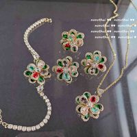 Wholesale Bright Rainbow Flower Earrings plated with K Gold Multi cut color treasure zircon flower rich flash Diamond