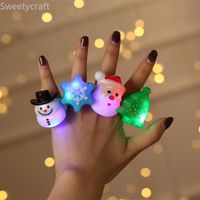 Wholesale Christmas Decorations LED Sparkling Stars Finger Rings Party Supplies Cartoon Ring Flashing Light Up Santa Claus Glow Favors