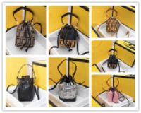 Wholesale Designer Mini mon Transparent tresor Bucket bag Handbag Leather drawstring Shoulder Bag Perforated Leather Women s Size x18x10CM