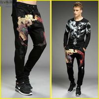 Wholesale Men s Tracksuits AreMoMuWha Two piece Casual Sports Sets Dragon Tattoo Long sleeved T shirt Bottoming Shirt Autumn Slim Feet Pants QX1093