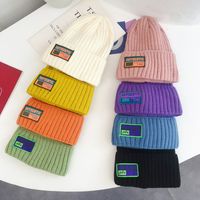 Wholesale Autumn and Winter Simple Pure Color Paste Cloth Wool Hat Korean Fashion Student Couple Knitted Age Reducing Pullover NA5L722