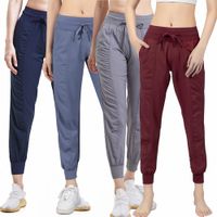Wholesale yoga women shaping high waist fitness harness foot trousers Outdoor Casual quick dry womens workout gym wear solid sports pants elastic