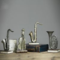 Wholesale Creative Music Home Furnishing Modern Decor Ornaments Sax Violin Trumpet Instrument Model Of Resin Crafts Saxophone Figure Gift Decorative O