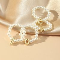 Wholesale 4pcs set LOVE letter Pearl Rings for Bride Wedding Party Jewelry Adjustable Elastic Bead Pearls Rings Set Women Valentine s Day Gifts