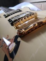 Wholesale free delivery custom les strings guitar milk yellow belle veneer HH pickups gold button shell inlay gold switch
