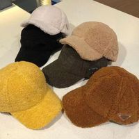 Wholesale Autumn and winter warm thickened baseball cap men s and women s lamb feather duck tongue cap Teddy knitted hat pure color light plate tide hat