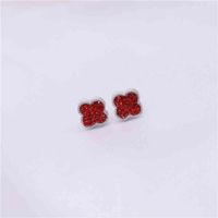 Wholesale New S925 sier needle Korean Earrings fashionable and exquisite set with red diamond clover temperament earrings female