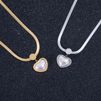 Wholesale Japan and South Korea shell peach heart necklace female titanium steel chain ins tiktok hot wave
