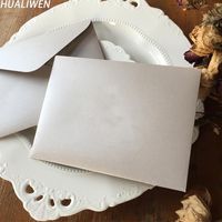 Wholesale Customized High end Exquisite Wedding Business g Thick Embossed Stamping Gray Pearlescent Paper Envelope Gift Wrap