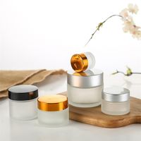 Wholesale Frosted Glass Jar Face Cream Bottle Cosmetic Container g g g g g g Lotion Bottles with Black Silver Gold Lids
