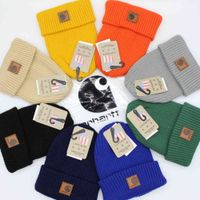 Wholesale Versatile striped leather label tooling wool hat men s and women s fashion br knitted autumn winter warm Ski Hat Pullover