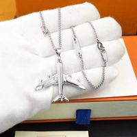 Wholesale New high quality men s and women s jewelry aircraft letter Pendant Necklace Fashion Party holiday gift accessories