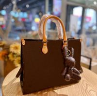 Wholesale Fashion Designers Onthego Shopping Bags with dog pendant crossbody book Handbag embossed High Quality women Tote handbags purse