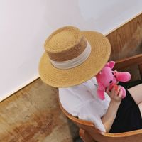 Wholesale red women s woven straw summer sunscreen Net wide brim flat top Beach Hat sun hat