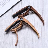 Wholesale Guitar ukulele capo can play string pin guitar accessories