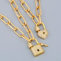Wholesale FLOLA Gold Long Chain Key Padlock Necklace For Women Crystal Heart Lock Pendant Cubic Zirconia Punk Jewelry Couple Gifts nker60