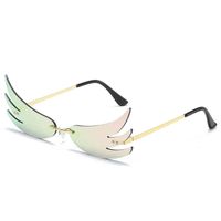 Wholesale Keloyi Fashion color lens eagle wings modeling sunglass Cool glass Young people personality framels sun glass